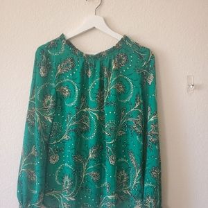 Ann Taylor blouse ties in the back.